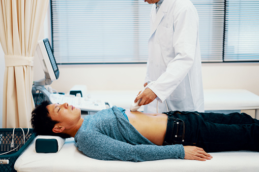Man getting abdominal ultrasound