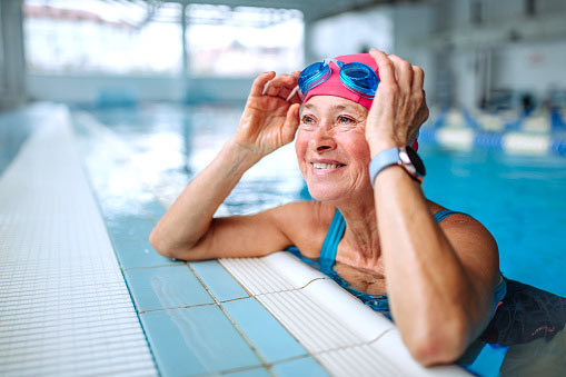 Senior woman in swimming pool